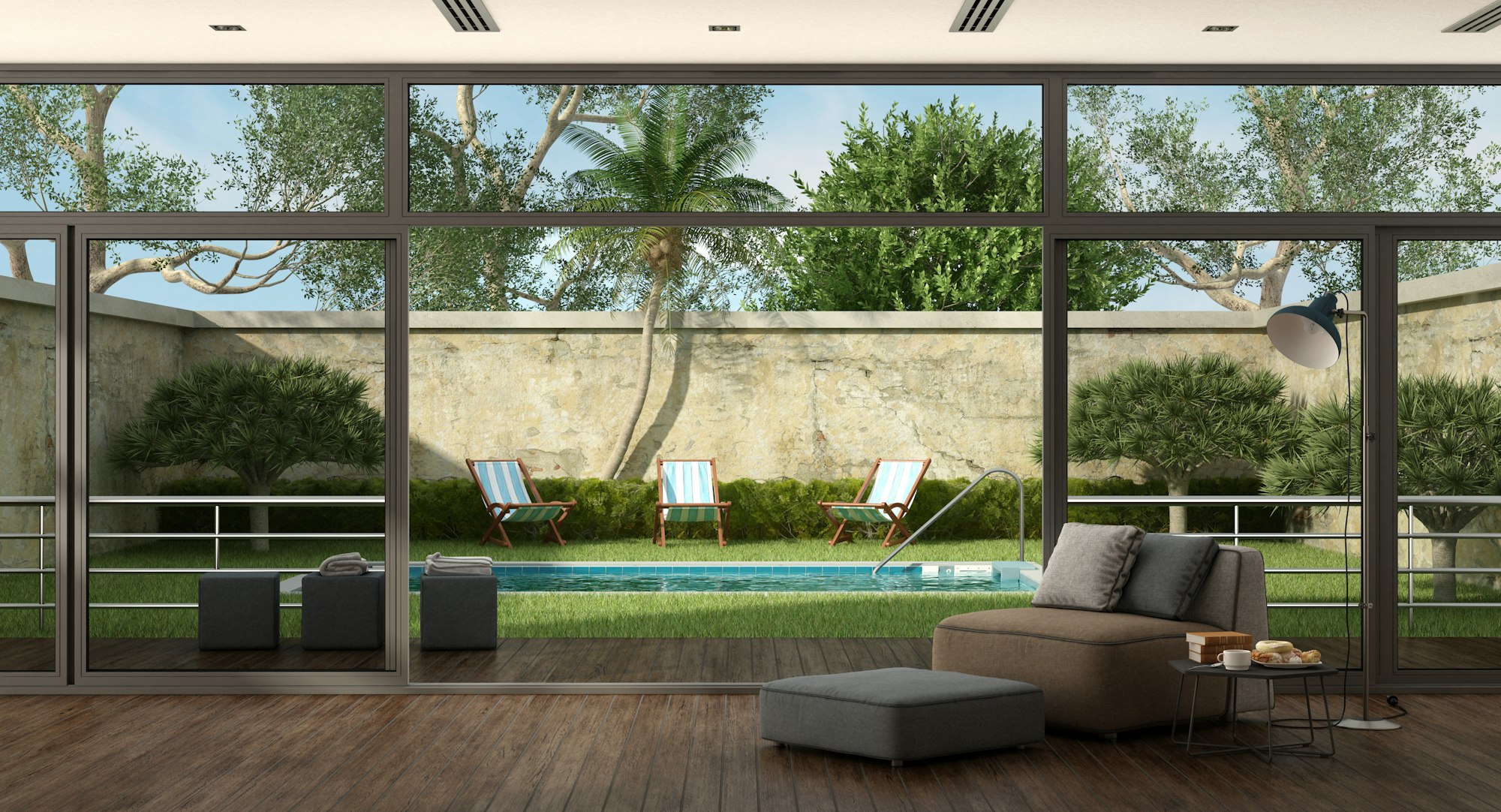 Wohnzimmer einer Immobilie mit Pool im Garten in Font de Sa Cala
